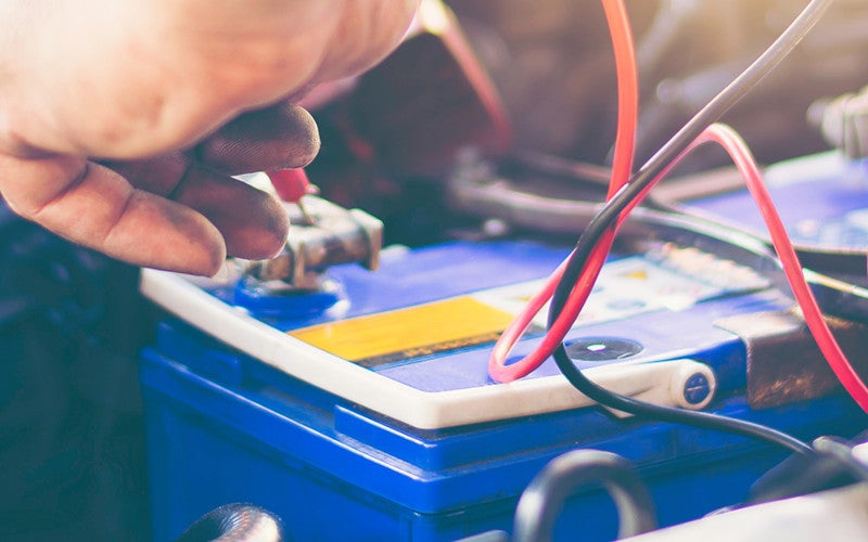 Connecting cables to a car battery
